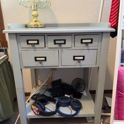 Blue accent table with drawers