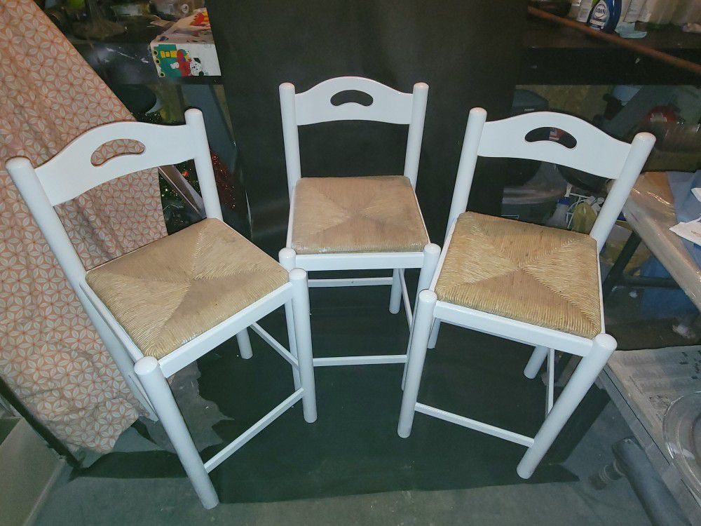 3 wooden barstools/wicker seat
