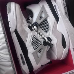 Air Jordan 4's Military Blacks