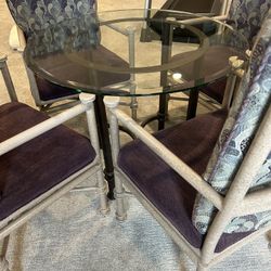 Glass Table With Turnable Chairs