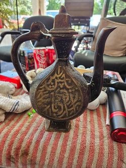 Made of brass, very old. Looks Arabic