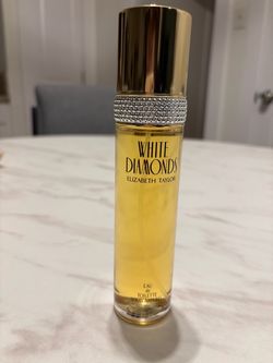 Brand new white diamonds perfume .