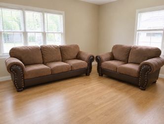 Brown leather round, faux suede studded sofa couch and loveseat