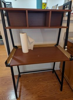Shelf 55 tall. 33 wide, must go by 5/20.