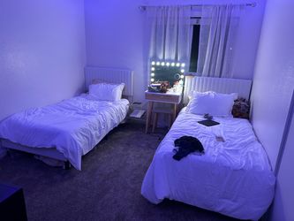 Two White Twin Bed Frames