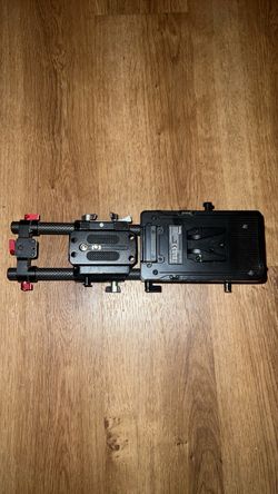 Camera rails and v mount attachment