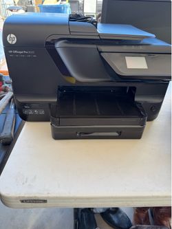 This is an HP Officejet Pro 8600 all-in-one printer, which features printing, scanning, copying, and faxing capabilities.