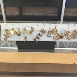 14 10k Gold pendant different prices and grams layaway available 10% down if you interested please make sure you ask for Maribel thank you