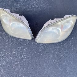 08 Chevy cobalt headlight lens