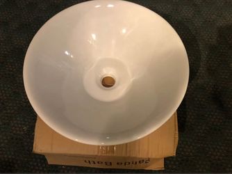White porcelain vitreous modern sink over the counter bowl