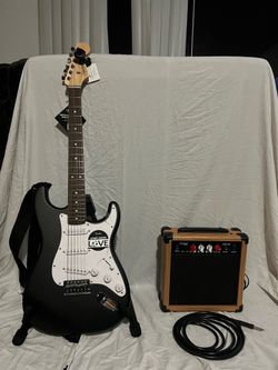 Squire Stratocaster Electric Guitar, Guitar AMP, Guitar stand, Strap - Beginner Kit