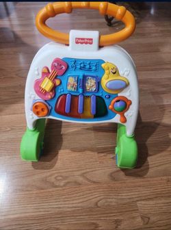 Fisher price baby walker used but clean, working and in good conditions