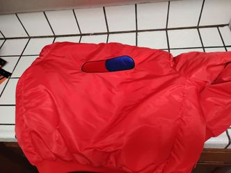 Red Puffer Jacket with Blue Patch Detail