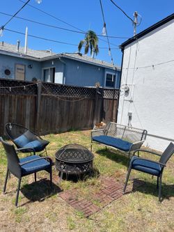 Outdoor seating and fire pit set
