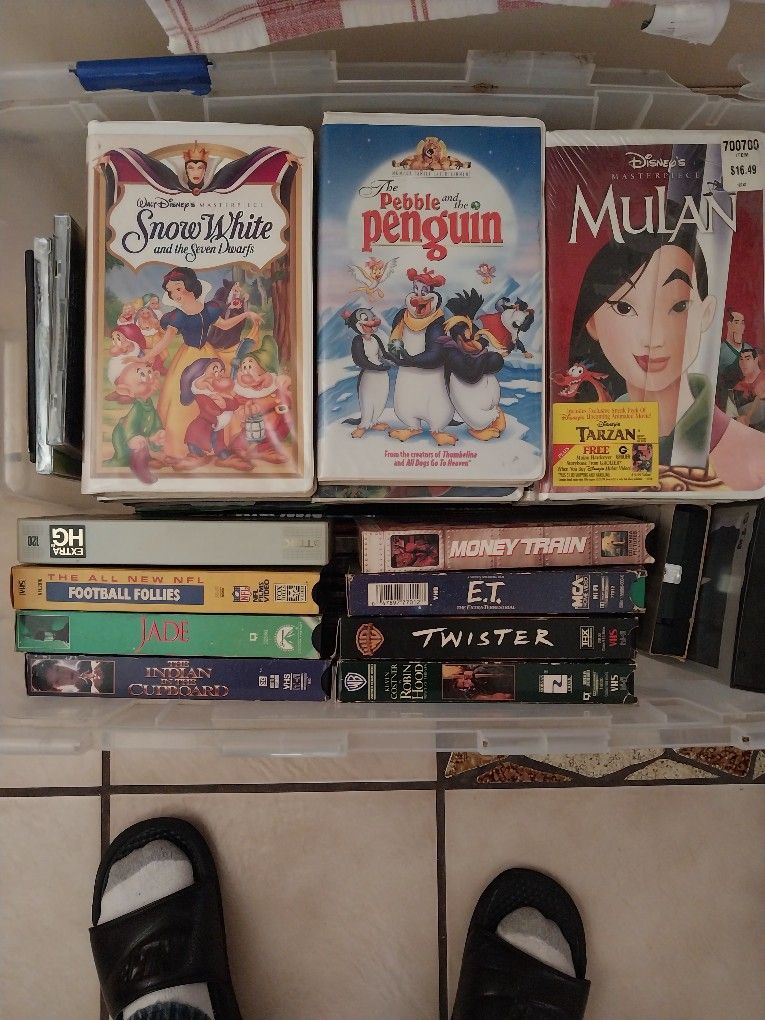 Tub Of DVD's and VHS Tapes