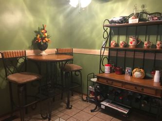 Hi bar table and chairs and bakers rack