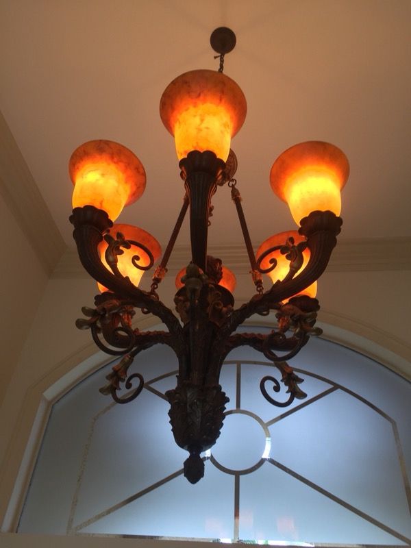 Stunning antique chandelier find for any room with beautiful shades.