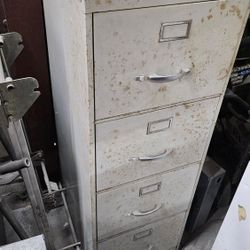 Four Drawer Steel Filing Cabinet About Five Feet Tall