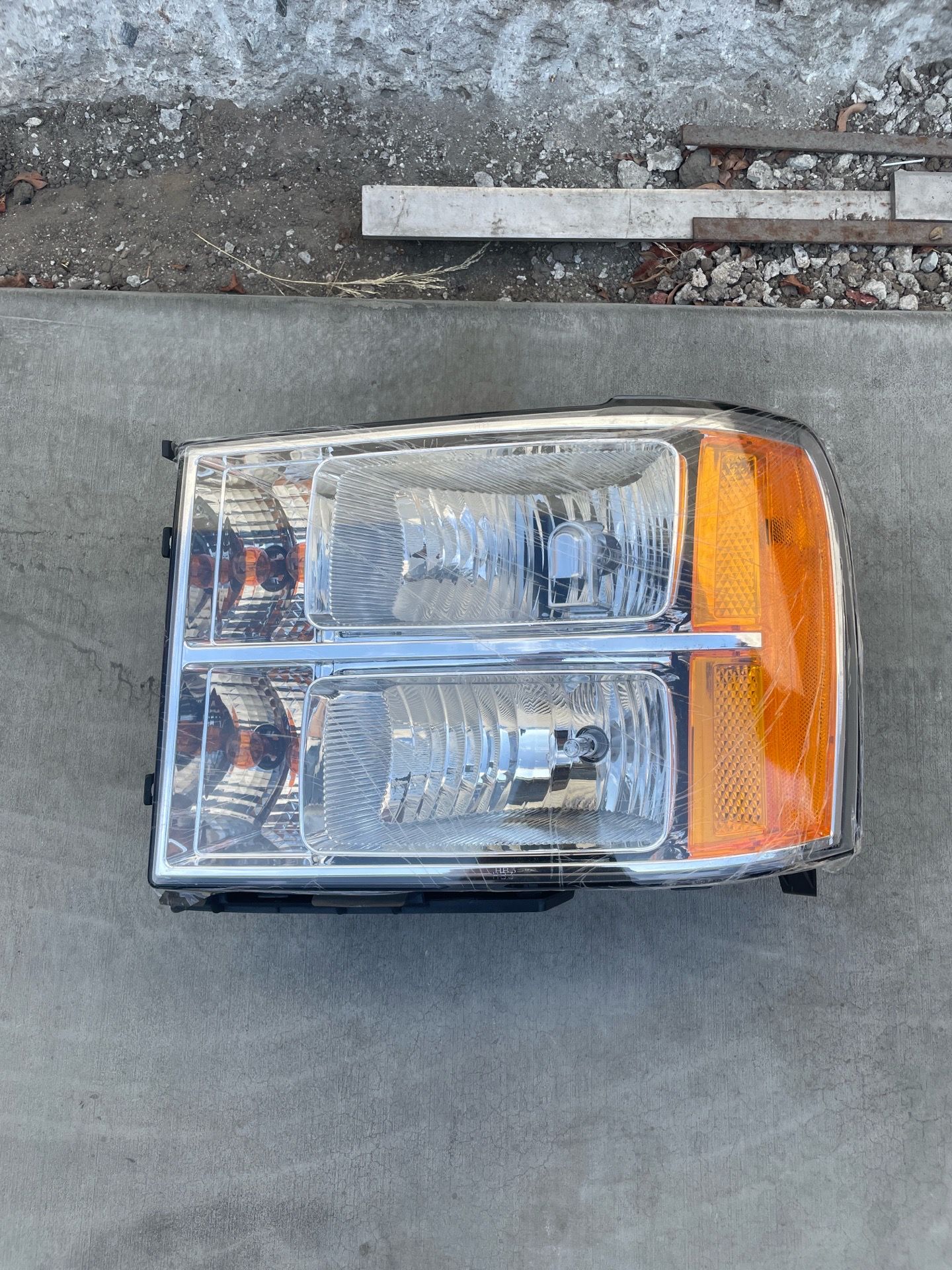 2007-2013 GMC Sierra Pickup Left Side Headlight