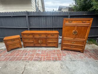 Henry link vintage three-piece bedroom set from the Henry Link "Mandarin" Collection, featuring burlwood veneer finishes and brass hardware