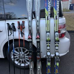 Volkl and Atomic skis with the poles