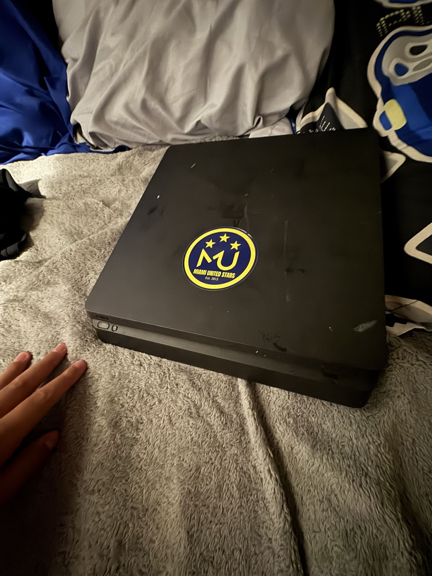 PS4 It’s not damaged it has two controllers and I has Everything