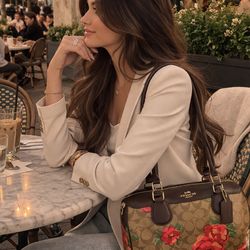 Unique Coach bag with a rose design 🌹✨