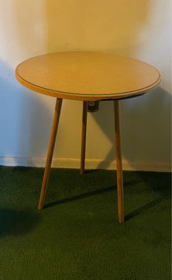 Round side table with glass topper