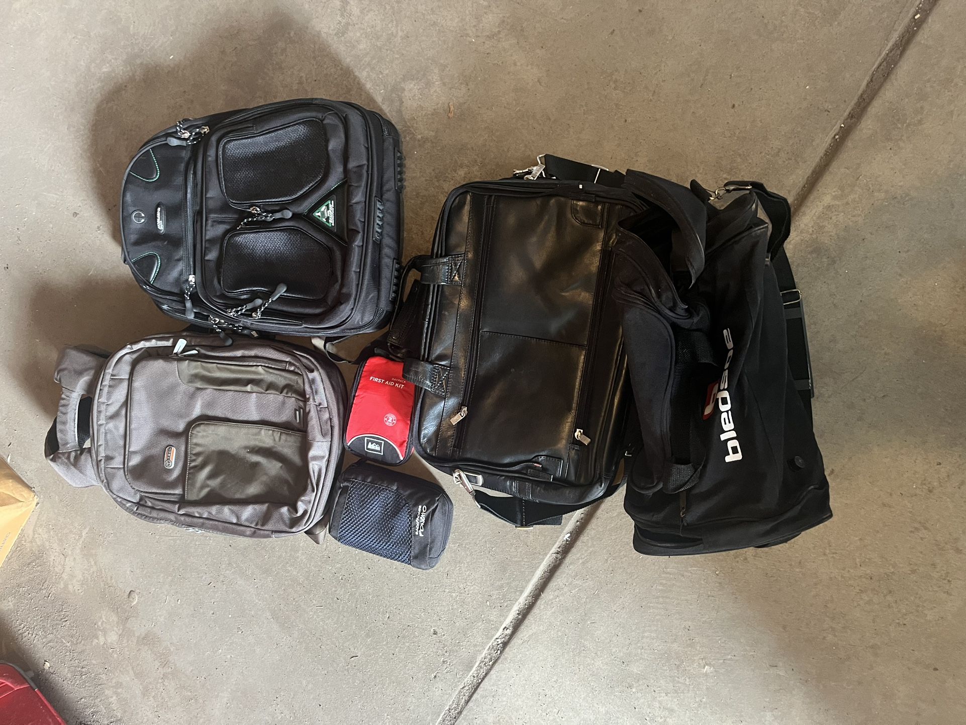 $25 really nice backpacks, a duffel bag, first aid kit, miscellaneous bag, black tan, man, woman child computer laptop luggag e devices, electronic sc
