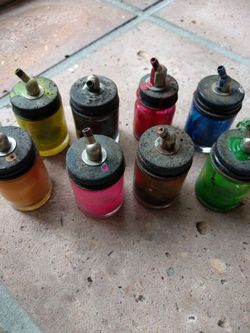 Nine airbtush paint bottles