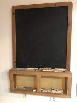 Chalk board with hooks and holes for storage