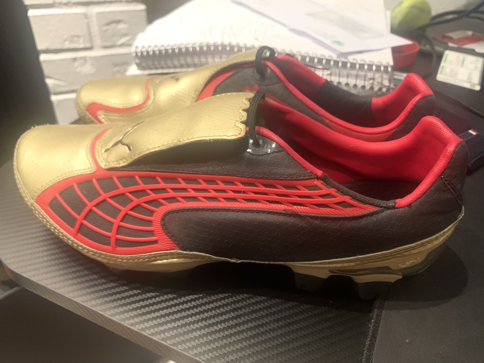 Puma v1.10 Black/Gold/Red Cleats