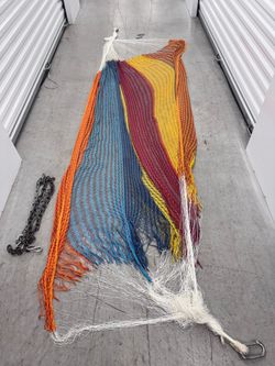 Multicolor Hamaca Torn and frayed hammock.