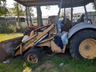 Ford 555E NewHolland backhoe