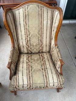 Vintage armchair with footrest