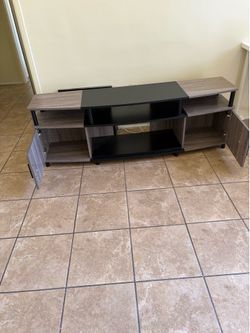 TV STAND LIKE NEW COLOR BLACK AND BEIGE