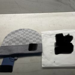 Grey Cherckred beanie please message me so I can give more info