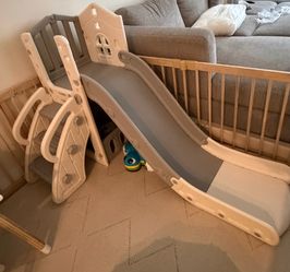 Play area - slide, table and playpen