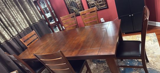 Extendable dinning table with 6 chairs