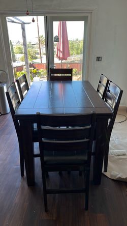 Wood dining table with 6 chairs