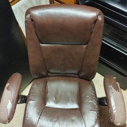 Swivel and tilt, rolling Leather office chair