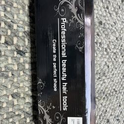 Hair Straightener And Curling Iron 