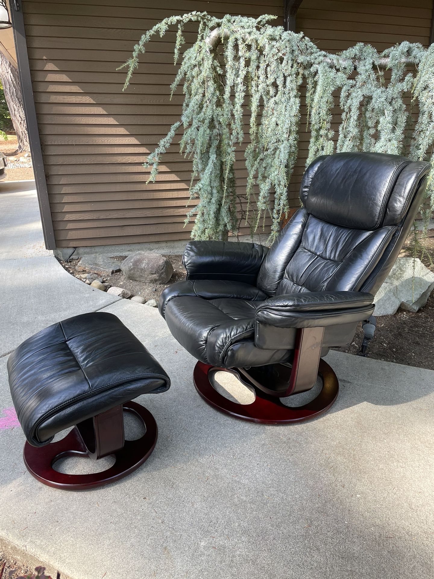 Lane Black Leather Recliner And Ottoman