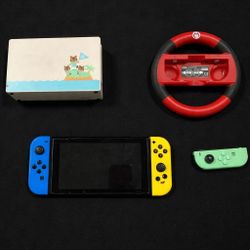 🎮 Nintendo Switch Bundle – Extra Controllers + Steering Wheel!