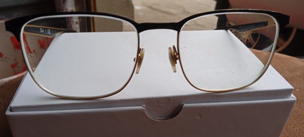 RAY BAN GOLD AND BROWN FRAMES