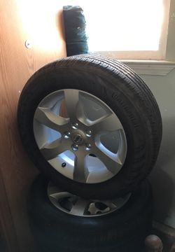 Tires and wheels for a nissan maxima 215/60/R16 continental