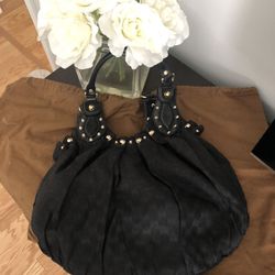 Authentic Gucci black GG canvas bag