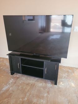 Samsung Large Flat Screen TV. 55" with black k TV https://offerup.co/faYXKzQFnY?$deeplink_path=/redirect/ only