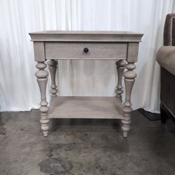 Light Greige Wood Nightstand with Turned Legs
