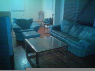Leather sofa/chair and table $200